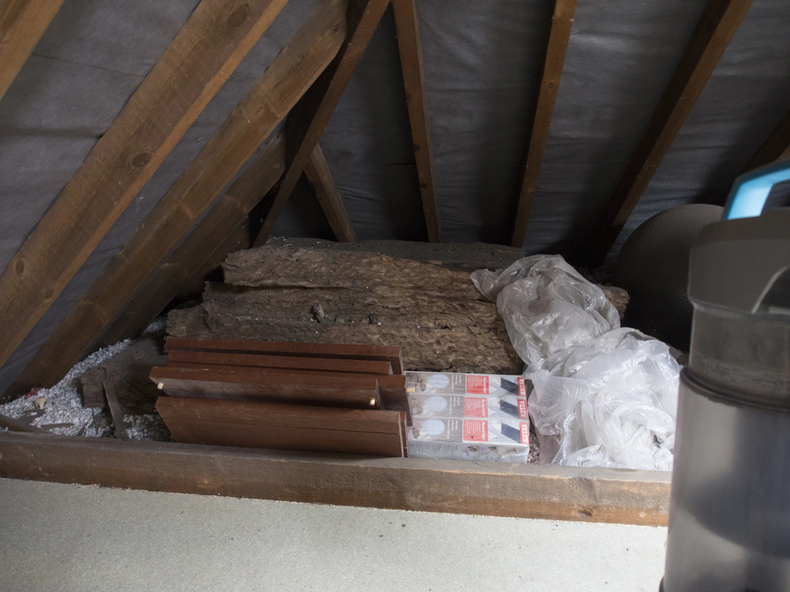 An open attic floor ready for blown-in insulation